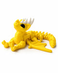 Jouet dragon cornu